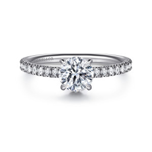 Gabriel & Co. ER16620R4W44JJ 14 karat white gold Classic engagement ring, front view of the round center on slender prongs with small diamonds running along both shoulders