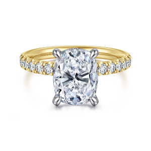 Gabriel & Co. ER16621G12M44JJ 14 karat white and yellow gold Contemporary engagement ring, front view of an elongated cushion center in four claws with diamonds along both shoulders