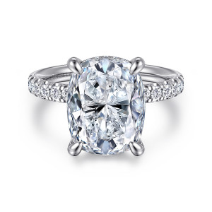Gabriel & Co. ER16621G20W44JJ 14 karat white gold Contemporary engagement ring, front view of an elongated cushion center in four claw prongs with stones down both band sides