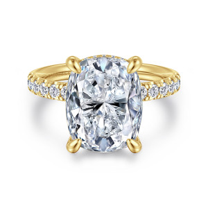Gabriel & Co. ER16621G20Y44JJ 14 karat yellow gold Contemporary engagement ring, front view of an elongated cushion center above a pave band with stones behind the seat