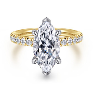 Gabriel & Co. ER16621M12M44JJ 14 karat white and yellow gold Contemporary engagement ring, front view of a marquise center with pointed tip prongs above a band lined with small diamonds