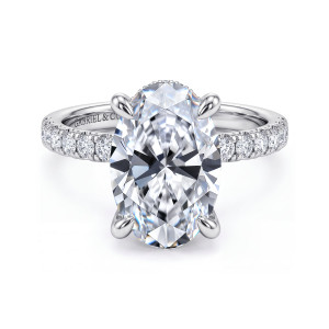 Gabriel & Co. ER16621O16W44JJ 14 karat white gold Contemporary engagement ring, front view of an oval center in four claws with diamonds along both shoulders