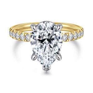 Gabriel & Co. ER16621P12M44JJ 14 karat white and yellow gold Contemporary engagement ring, front view of a pear shaped center with a V tip prong and round diamonds along the band