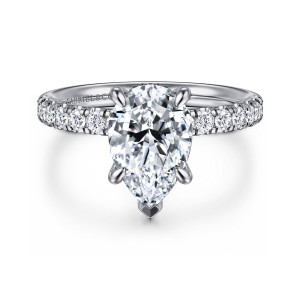 Gabriel & Co. ER16621P8W44JJ 14 karat white gold Contemporary engagement ring, front view of the pear shaped center with a V shaped tip prong and diamonds on both shoulders