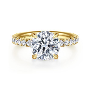 Gabriel & Co. ER16621R12Y44JJ 14 karat yellow gold Contemporary engagement ring, front view of a round center on tapered claw prongs flanked by prong set diamonds on the band