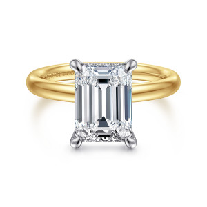 Gabriel & Co. ER16622E12M44JJ 14 karat white and yellow gold Classic engagement ring, front view of an emerald cut center in four corner prongs on a plain rounded band
