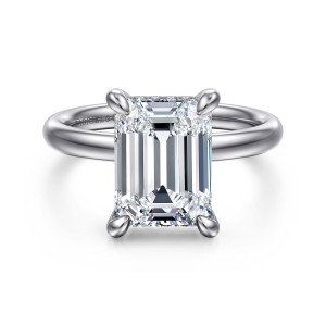 Gabriel & Co. ER16622E16W44JJ 14 karat white gold Classic engagement ring, front view of an emerald cut center in four prongs on a polished band