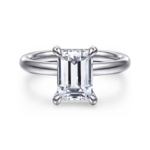 Gabriel & Co. ER16622E8W44JJ 14 karat white gold Classic engagement ring, front view of an emerald cut center in teardrop shaped prongs on a smooth, plain band