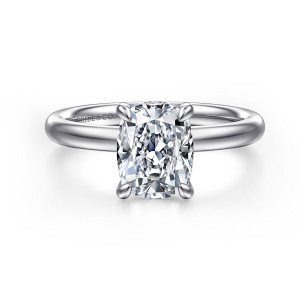 Gabriel & Co. ER16622G8W44JJ 14 karat white gold Classic engagement ring, front view of an elongated cushion center between four claw prongs on a smooth band