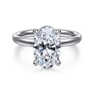 Gabriel & Co. ER16622O12W44JJ 14 karat white gold Classic engagement ring, front view of an oval center on clawed prongs over a plain rounded band