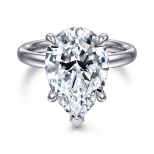 Gabriel & Co. ER16622P20W44JJ 14 karat white gold Classic engagement ring, front view of a pear shaped center held by claw prongs and a pointed tip prong