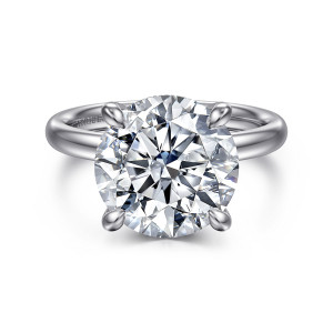 Gabriel & Co. ER16622R20W44JJ 14 karat white gold Classic engagement ring, front view of a round center held by four claw prongs above a smooth rounded band