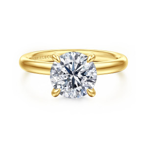 Gabriel & Co. ER16622R8Y44JJ 14 karat yellow gold Classic engagement ring, front view of a round center gripped by tapered prongs on a plain rounded band