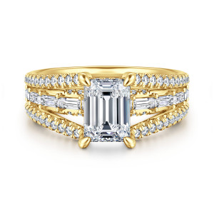 Gabriel & Co. ER16639E6Y44JJ 14 karat yellow gold Contemporary engagement ring, front view of an emerald cut center with a middle rail of baguette stones beside the head