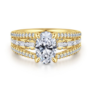 Gabriel & Co. ER16639O6Y44JJ 14 karat yellow gold Contemporary engagement ring, front view of an oval center between lanes of round and baguette diamonds on a wide band
