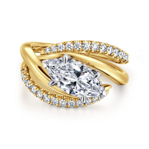 Gabriel & Co. ER16643M6M44JJ 14 karat white and yellow gold Contemporary engagement ring, front view of a marquise center tilted across the head between sweeping stone rows