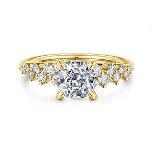Gabriel & Co. ER16665C6Y44JJ 14 karat yellow gold Starlight engagement ring, front view of a cushion center between zigzag clusters of round diamonds on both shoulders