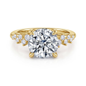 Gabriel & Co. ER16665R12Y44JJ 14 karat yellow gold Starlight engagement ring, front view of a large round center flanked by staggered small diamonds on each shoulder