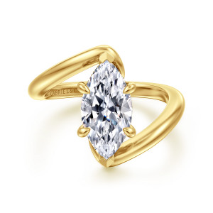 Gabriel & Co. ER16667M8Y44JJ 14 karat yellow gold Bujukan engagement ring, front view of a marquise center with pointed tip prongs between the bypass ends
