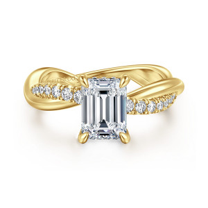 Gabriel & Co. ER16669E6Y44JJ 14 karat yellow gold Contemporary engagement ring, front view of the emerald cut center between the crossing strands of the twisted band