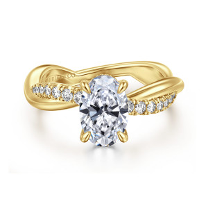 Gabriel & Co. ER16669O6Y44JJ 14 karat yellow gold Contemporary engagement ring, front view of an oval center above a twisting band with diamonds along both shoulders