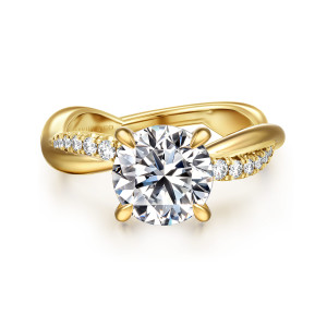 Gabriel & Co. ER16669R8Y44JJ 14 karat yellow gold Contemporary engagement ring, front view of the round center with claw prongs and diamond rows on the twisting band