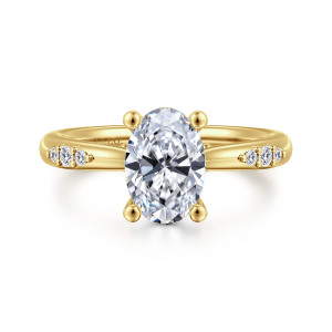 Gabriel & Co. ER16670O6Y44JJ 14 karat yellow gold Contemporary engagement ring, front view of an oval center on four ball tipped prongs with small diamonds on each shoulder