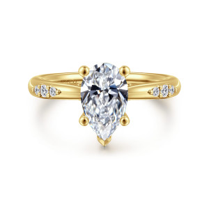Gabriel & Co. ER16670P6Y44JJ 14 karat yellow gold Contemporary engagement ring, front view of a pear shaped center with ball tipped prongs and a V shaped tip guard