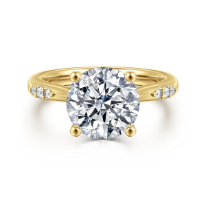 Gabriel & Co. ER16670R12Y44JJ 14 karat yellow gold Contemporary engagement ring, front view of a round center with ball tipped prongs and diamond clusters on each shoulder