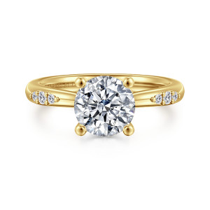 Gabriel & Co. ER16670R6Y44JJ 14 karat yellow gold Contemporary engagement ring, front view of a round center held by ball tipped prongs with small diamond trios on both shoulders