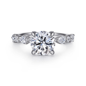 Gabriel & Co. ER16672R8W44JJ 14 karat white gold Victorian engagement ring, front view of a round center between beaded seats of round and elongated stones