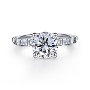 Gabriel & Co. ER16674R8W44JJ 14 karat white gold Contemporary engagement ring, front view of a round center on four ball tipped prongs above baguettes divided by thin bars