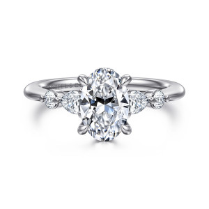 Gabriel & Co. ER16677O6T44JJ 14 karat white and rose gold Contemporary engagement ring, front view of the oval center with an elongated stone and a round stone on each side