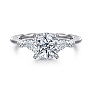 Gabriel & Co. ER16677R6T44JJ 14 karat white and rose gold Contemporary engagement ring, front view of a round center between paired side stones on a thin plain band