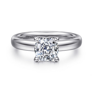 Gabriel & Co. ER16680C6W84JJ 18 karat white gold Classic engagement ring, front view of a cushion shaped center in rounded claw prongs on a broad polished band