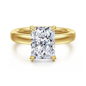 Gabriel & Co. ER16680N12Y44JJ 14 karat yellow gold Bujukan engagement ring, front view of a radiant center in four rounded claws on a broad glossy band
