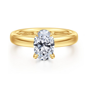 Gabriel & Co. ER16680O6Y84JJ 18 karat yellow gold Classic engagement ring, front view of an oval center on a broad, plain band with a maker's mark inside