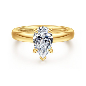 Gabriel & Co. ER16680P6Y84JJ 18 karat yellow gold Classic engagement ring, front view of a pear shaped center with a pointed V tip prong on a broad smooth band
