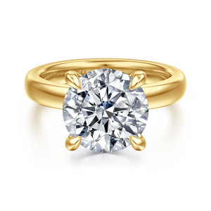 Gabriel & Co. ER16680R16Y44JJ 14 karat yellow gold Bujukan engagement ring, front view of a round center in claw prongs on a broad domed band