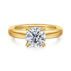 Gabriel & Co. ER16680R6Y84JJ 18 karat yellow gold Classic engagement ring, front view of a round center between four rounded prongs on a wide, plain domed band