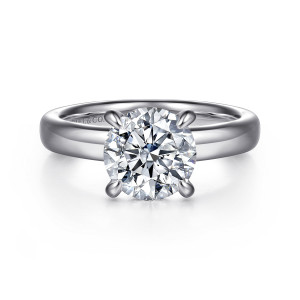 Gabriel & Co. ER16680R8W44JJ 14 karat white gold Classic engagement ring, front view of a round center in four claws over a broad polished band