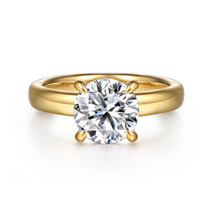 Gabriel & Co. ER16680R8Y44JJ 14 karat yellow gold Classic engagement ring, front view of a round center on four tapered prongs above a broad domed band