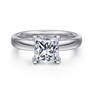 Gabriel & Co. ER16680S6W44JJ 14 karat white gold Classic engagement ring, front view of a princess cut center gripped at its corners by flat faced prongs