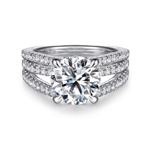 Gabriel & Co. ER16682R12W44JJ 14 karat white gold Contemporary engagement ring, front view of a round center above strands of small round stones with pointed prongs