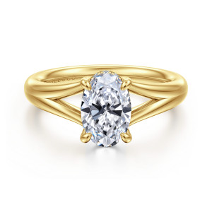Gabriel & Co. ER16683O6Y44JJ 14 karat yellow gold Contemporary engagement ring, front view of an oval center with the band parting into strands and open gaps beside the stone