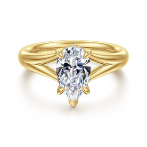 Gabriel & Co. ER16683P6Y44JJ 14 karat yellow gold Contemporary engagement ring, front view of a pear shaped center with a V shaped tip prong above a split shank