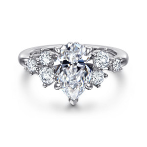 Gabriel & Co. ER16684P8W44JJ 14 karat white gold Starlight engagement ring, front view of a pear shaped center with round diamond clusters on both shoulders