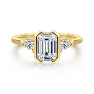 Gabriel & Co. ER16685E6Y44JJ 14 karat yellow gold Contemporary engagement ring, front view of the emerald cut center between flat walls with a pear shaped diamond on each side