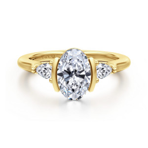 Gabriel & Co. ER16685O6Y44JJ 14 karat yellow gold Contemporary engagement ring, front view of an oval center gripped by flat bars, with a pear shaped stone at each side
