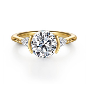 Gabriel & Co. ER16685R8Y44JJ 14 karat yellow gold Contemporary engagement ring, front view of a round center gripped by curved side bars, with a pear stone on each side